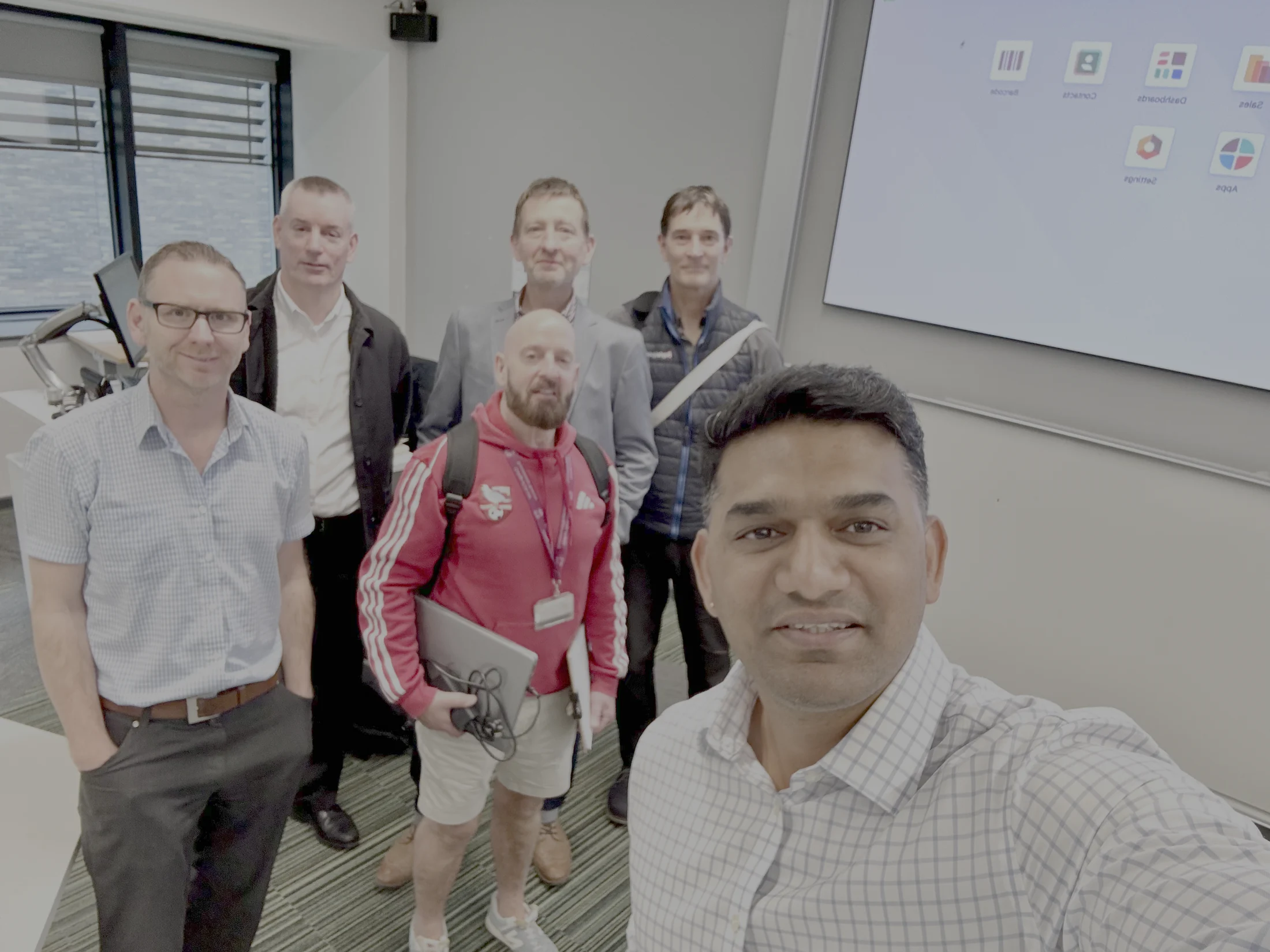 ThoughtLogik CEO with a client team after an Odoo training session